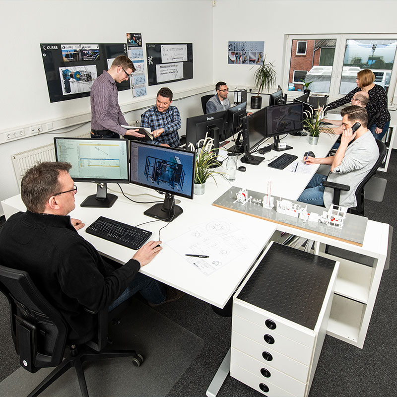 Employees from sales and design work in one office and exchange ideas